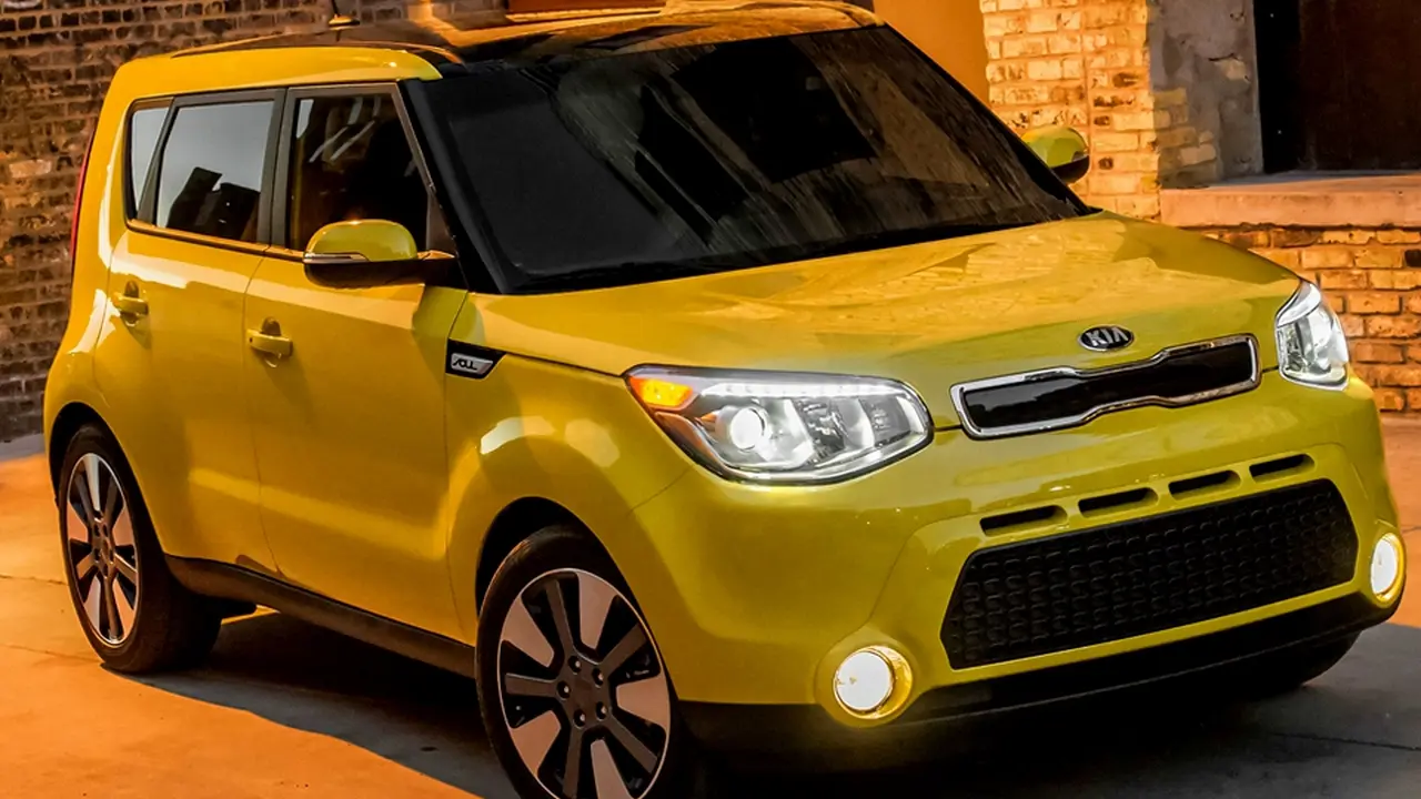 overhead view of corned beef sliced and on a platter with cabbage, potatoes, and carrots